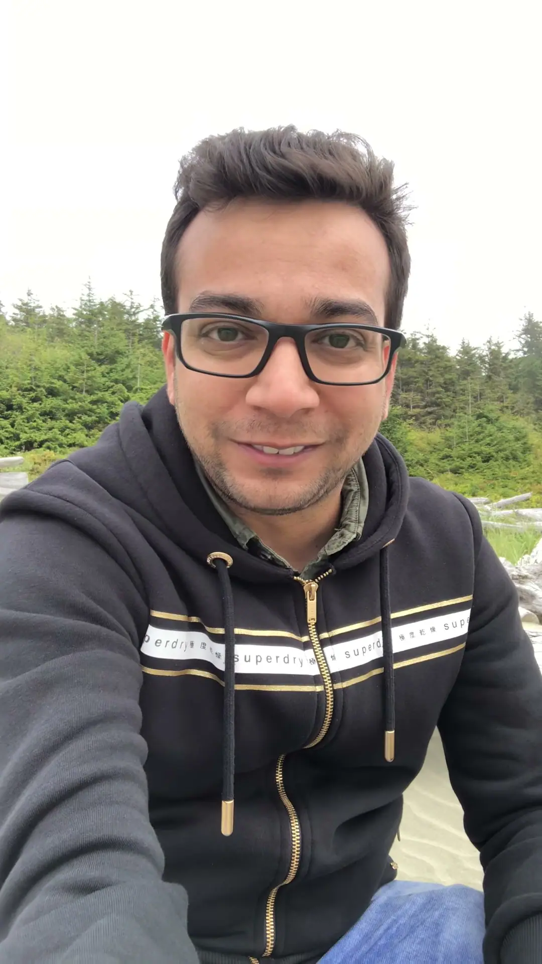 Nabil Valiulla smiling on the beach