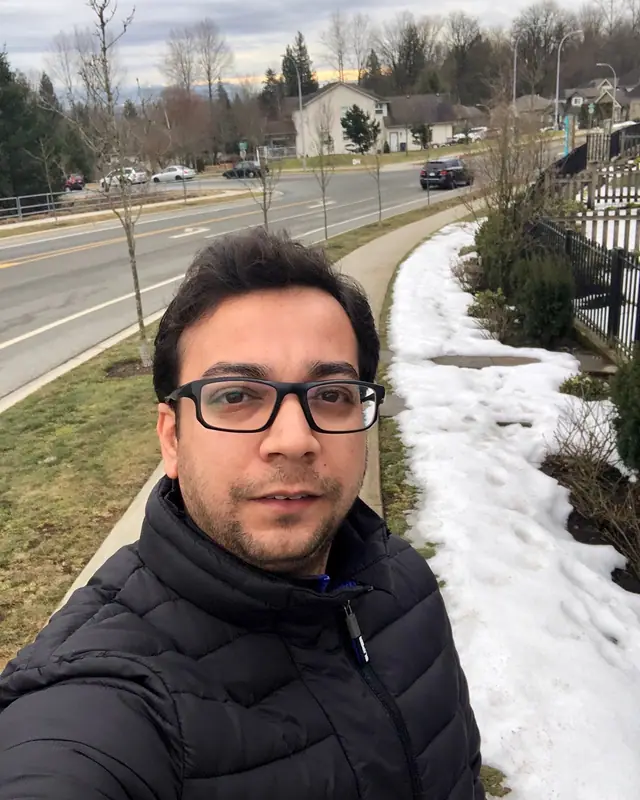 Nabil Valiulla on a snowy roadside